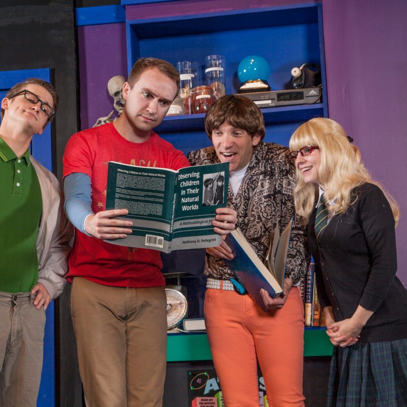 a group of people standing in a room