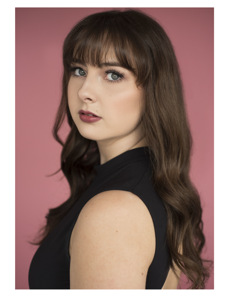 a woman looking at the camera