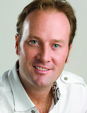 a man smiling for the camera