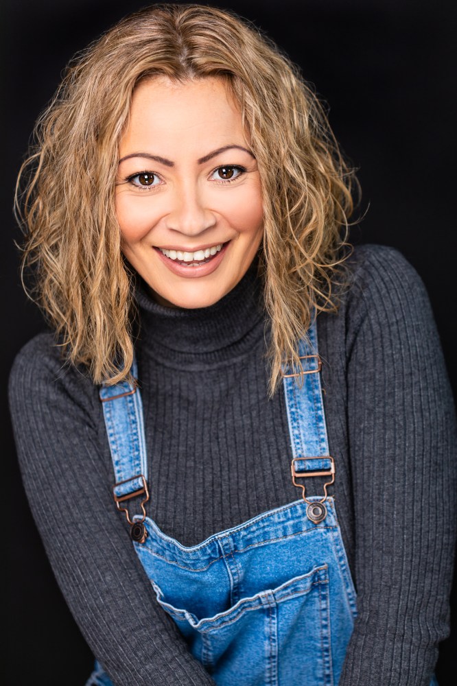a woman smiling for the camera