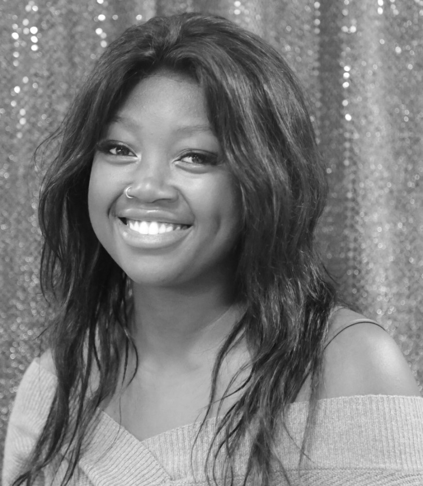 a woman smiling for the camera