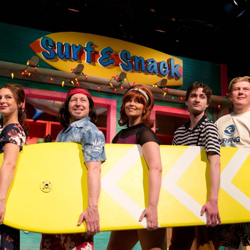 a group of people posing for the camera